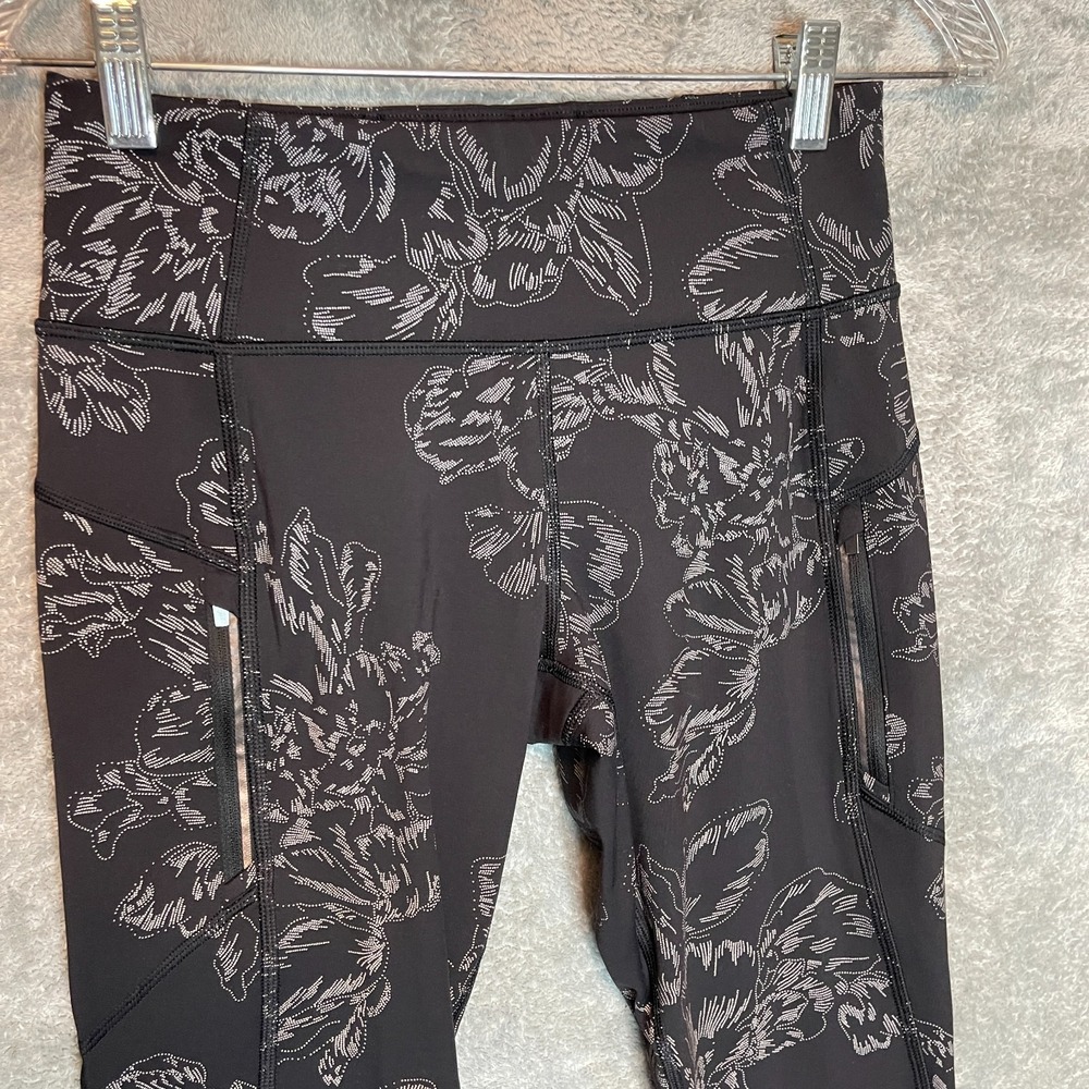 Athleta Women Rainier Reflective Tight Small Floral Zip Pockets High Rise Ankle